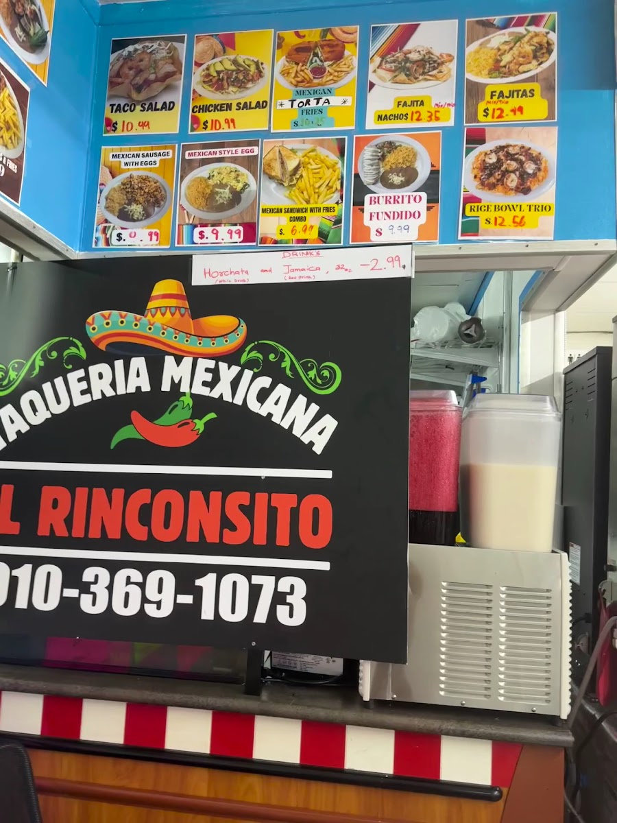 Taqueria mexicana el Rinconsito menu board