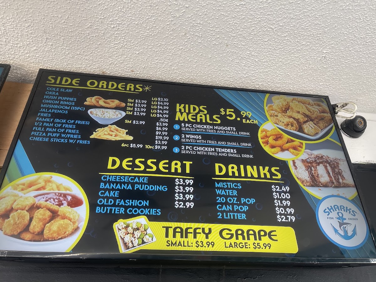 SHARKS FISH & CHIKEN menu board