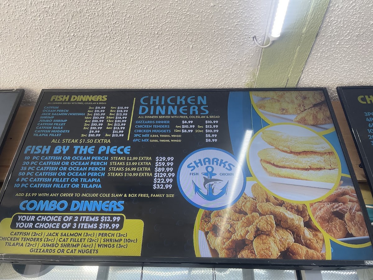 SHARKS FISH & CHIKEN menu board