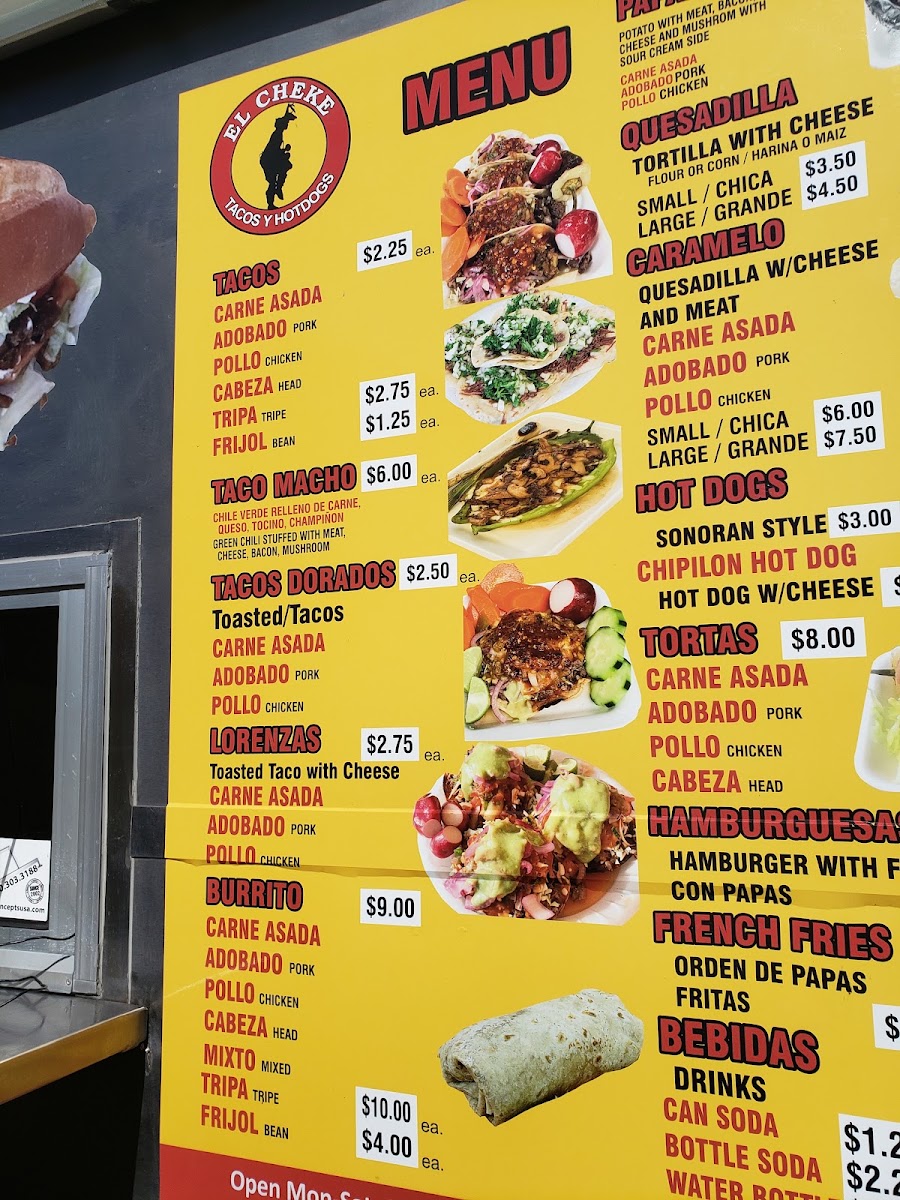 Taquería el Cheke menu board