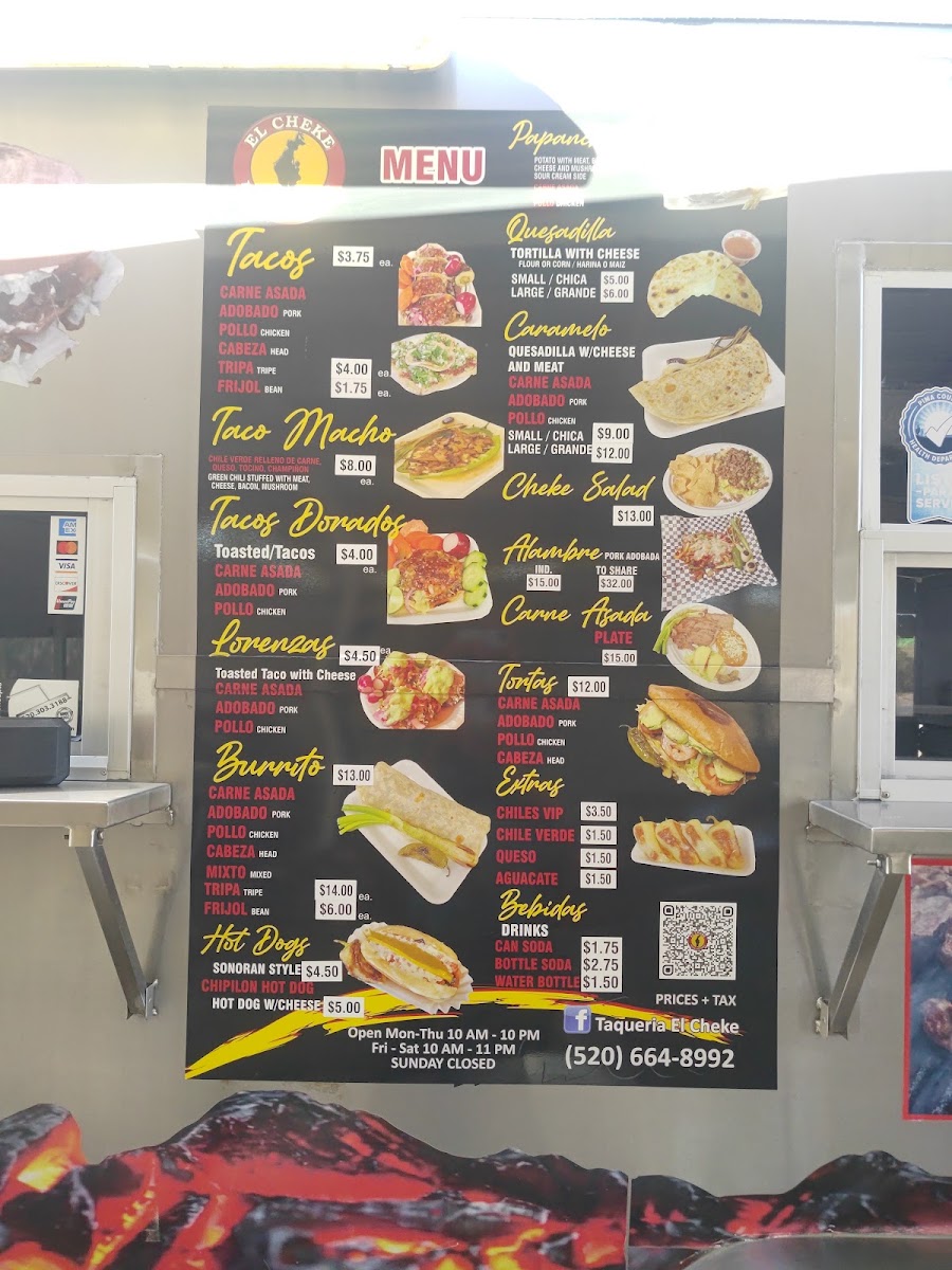 Taquería el Cheke menu board