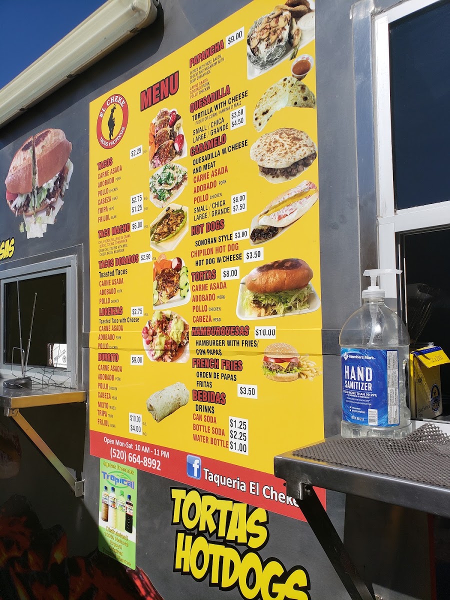Taquería el Cheke menu board