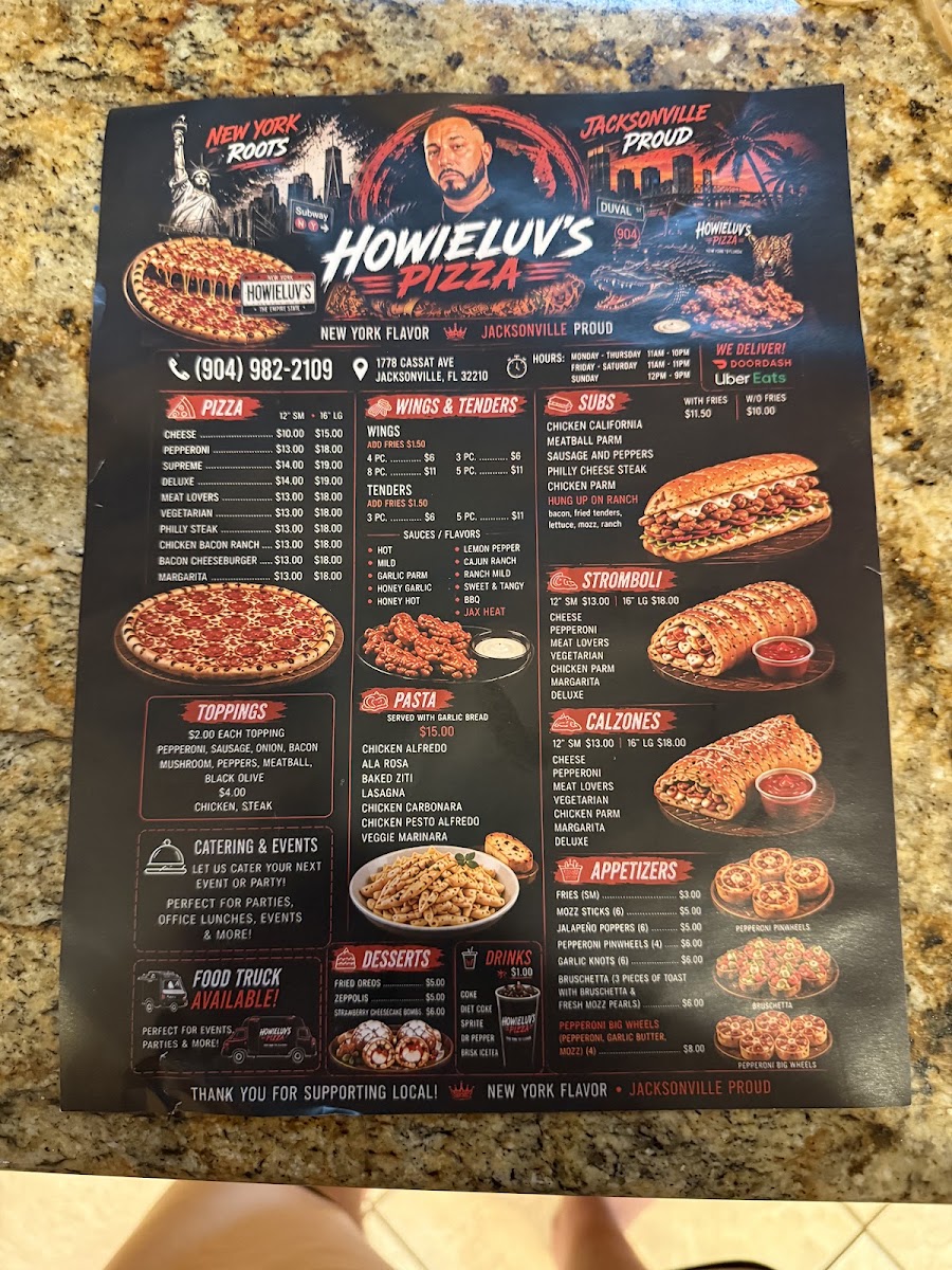 Howieluv's Pizza Wings And Subs menu board