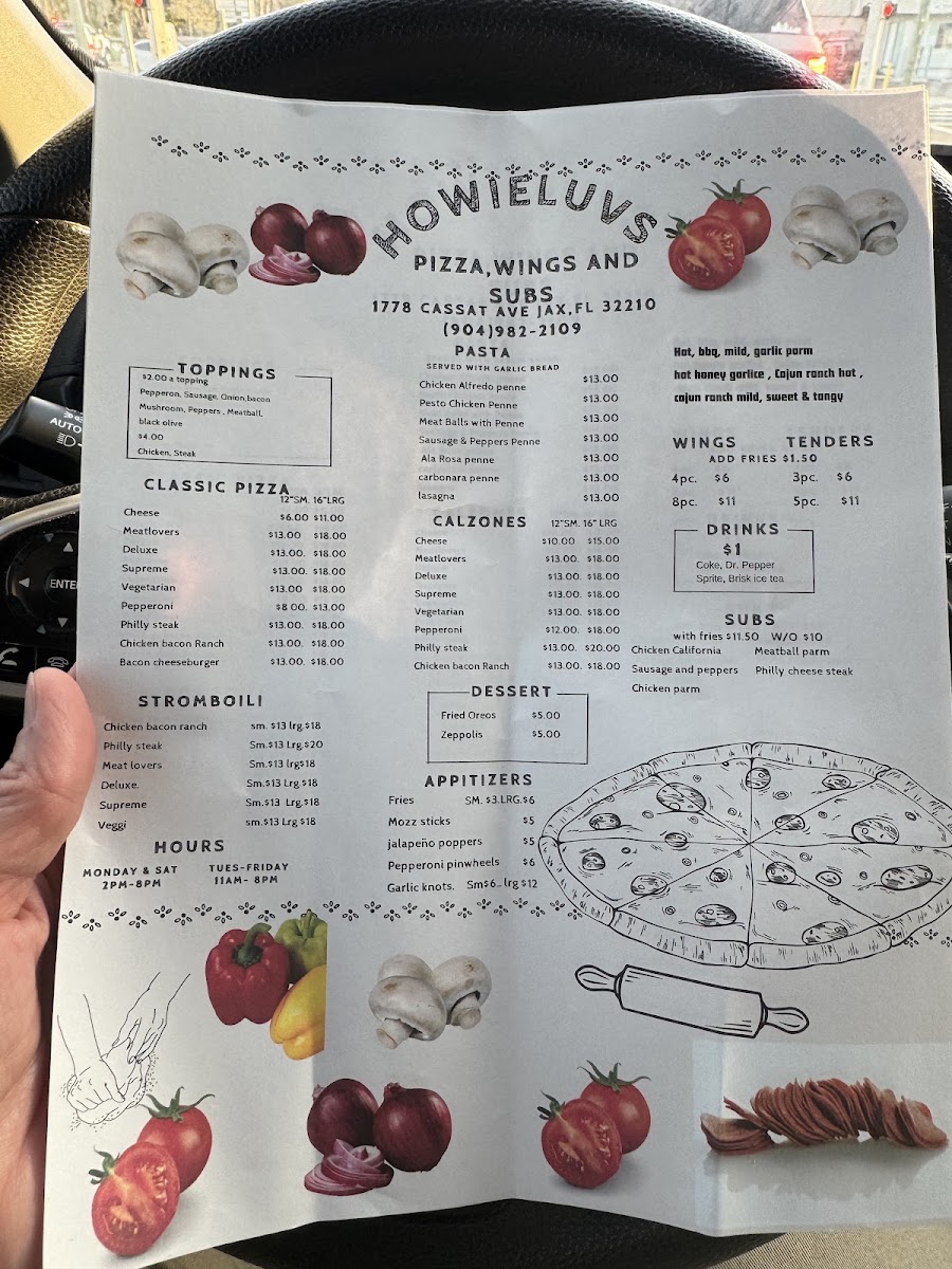 Howieluv's Pizza Wings And Subs menu board