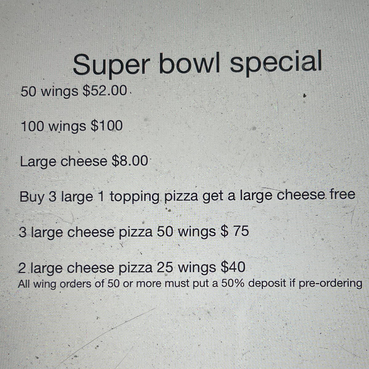 Howieluv's Pizza Wings And Subs menu board