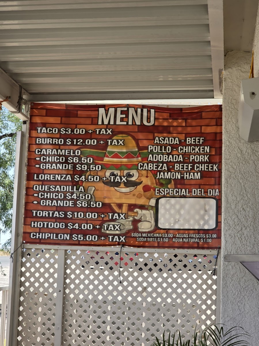 JV Tacos Y Hot Dogs menu board