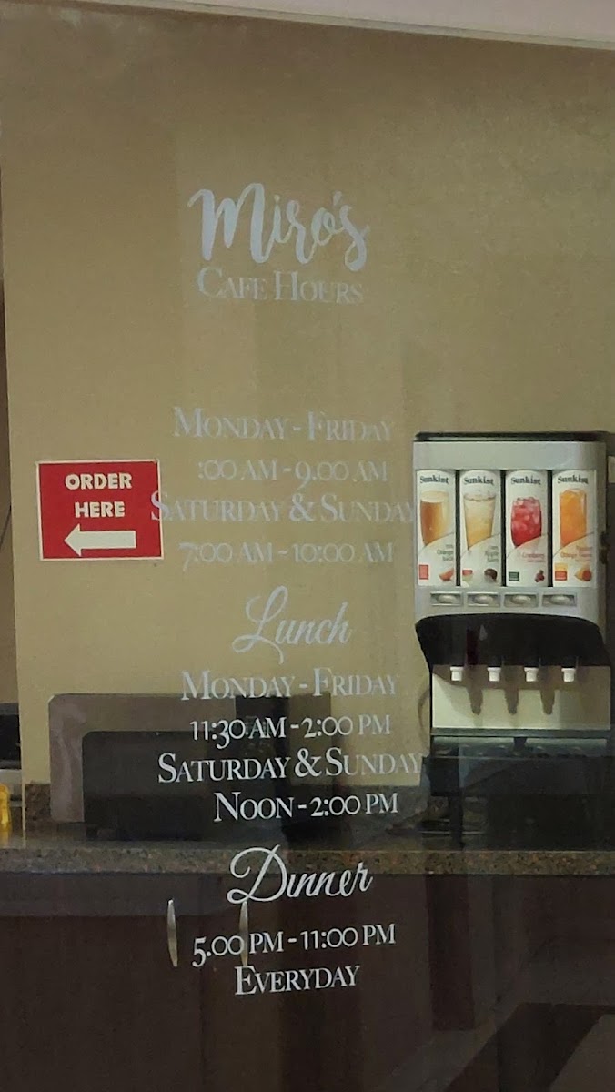 Moto's Cafe menu board