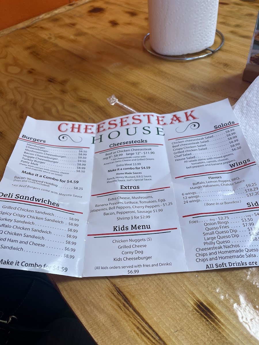 Cheesesteak House menu board
