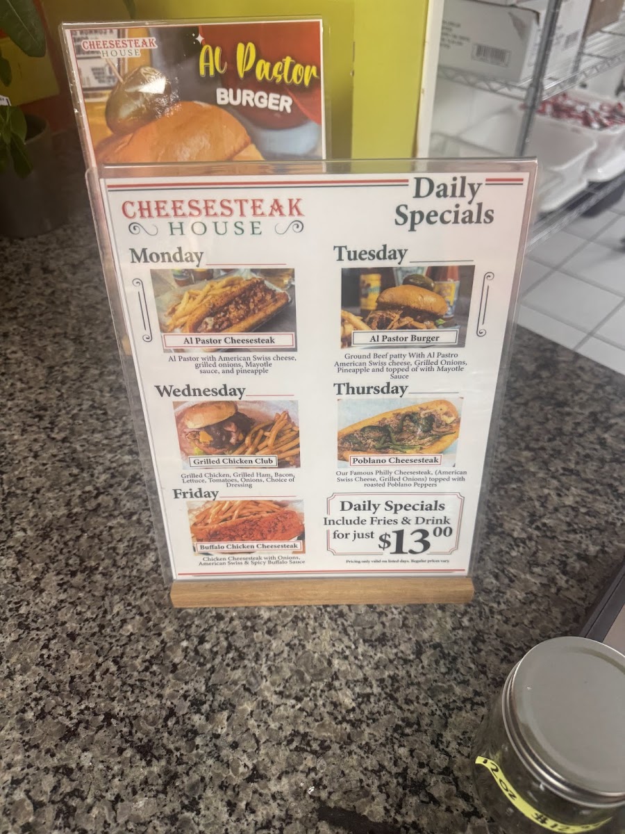 Cheesesteak House menu board