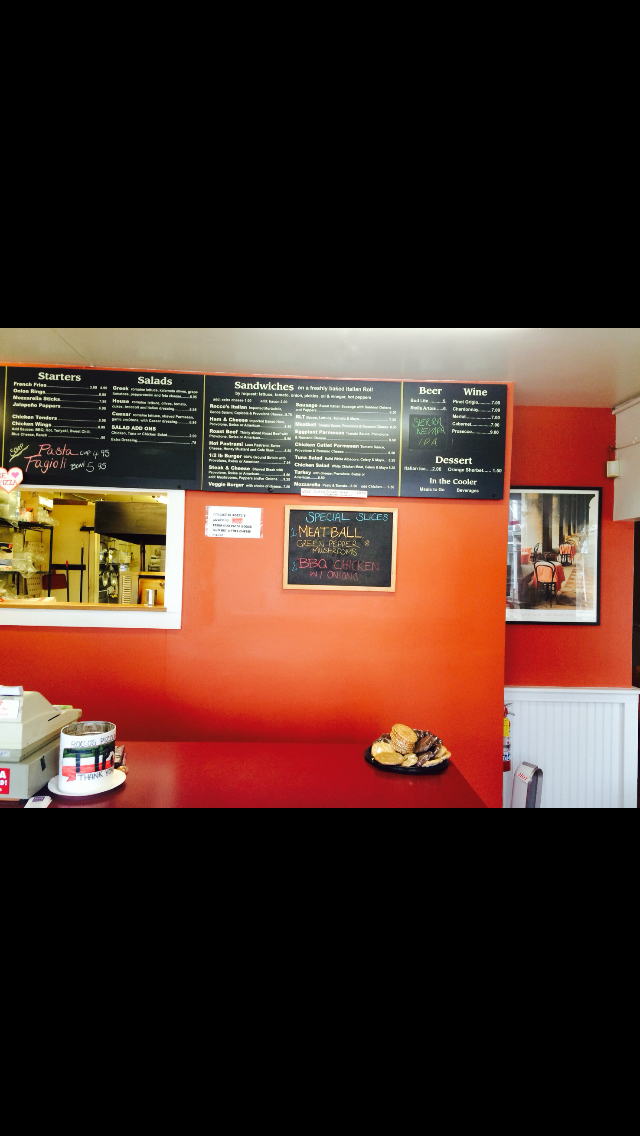 Rocco's Pizzeria menu board