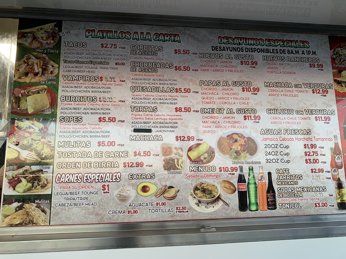 Tacos Los Plebes menu board