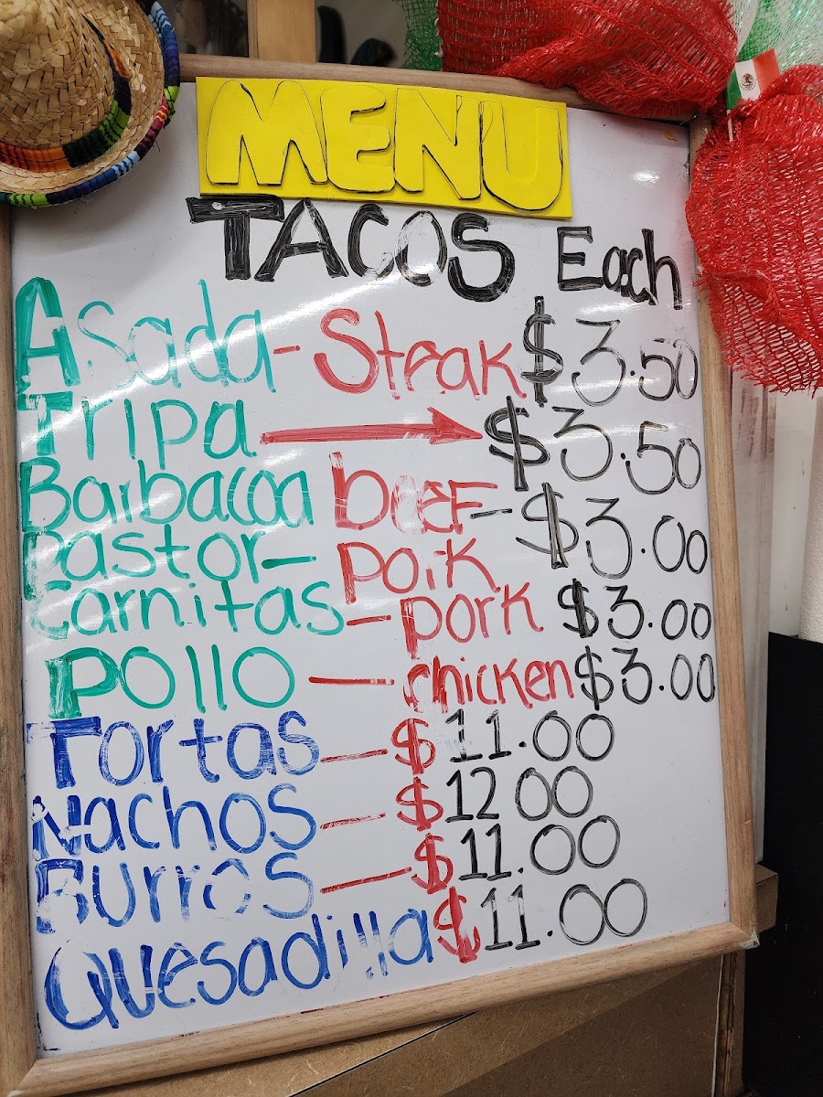 Taquizas El Pelon menu board