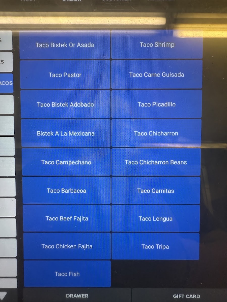 Taqueria La Guadalupana menu board