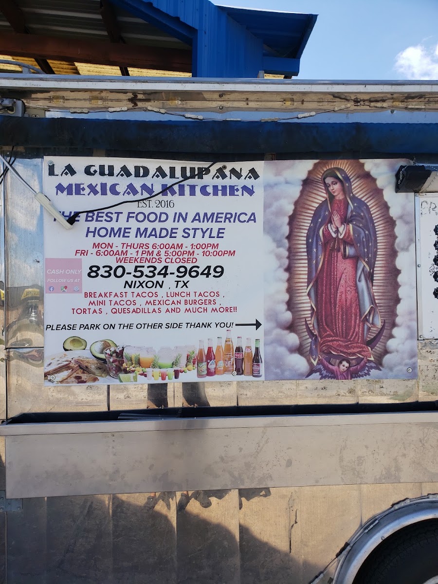 Taqueria La Guadalupana menu board