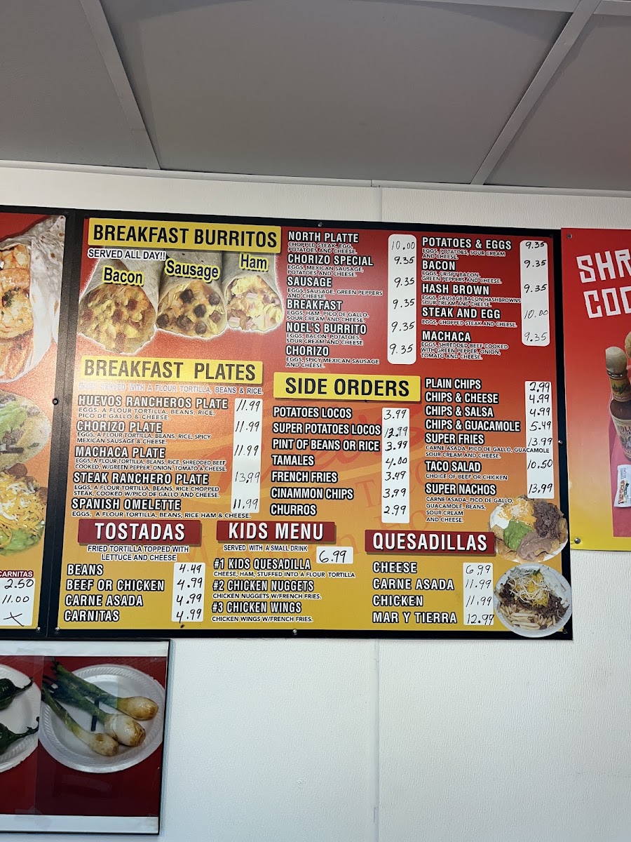 Noels tacos menu board