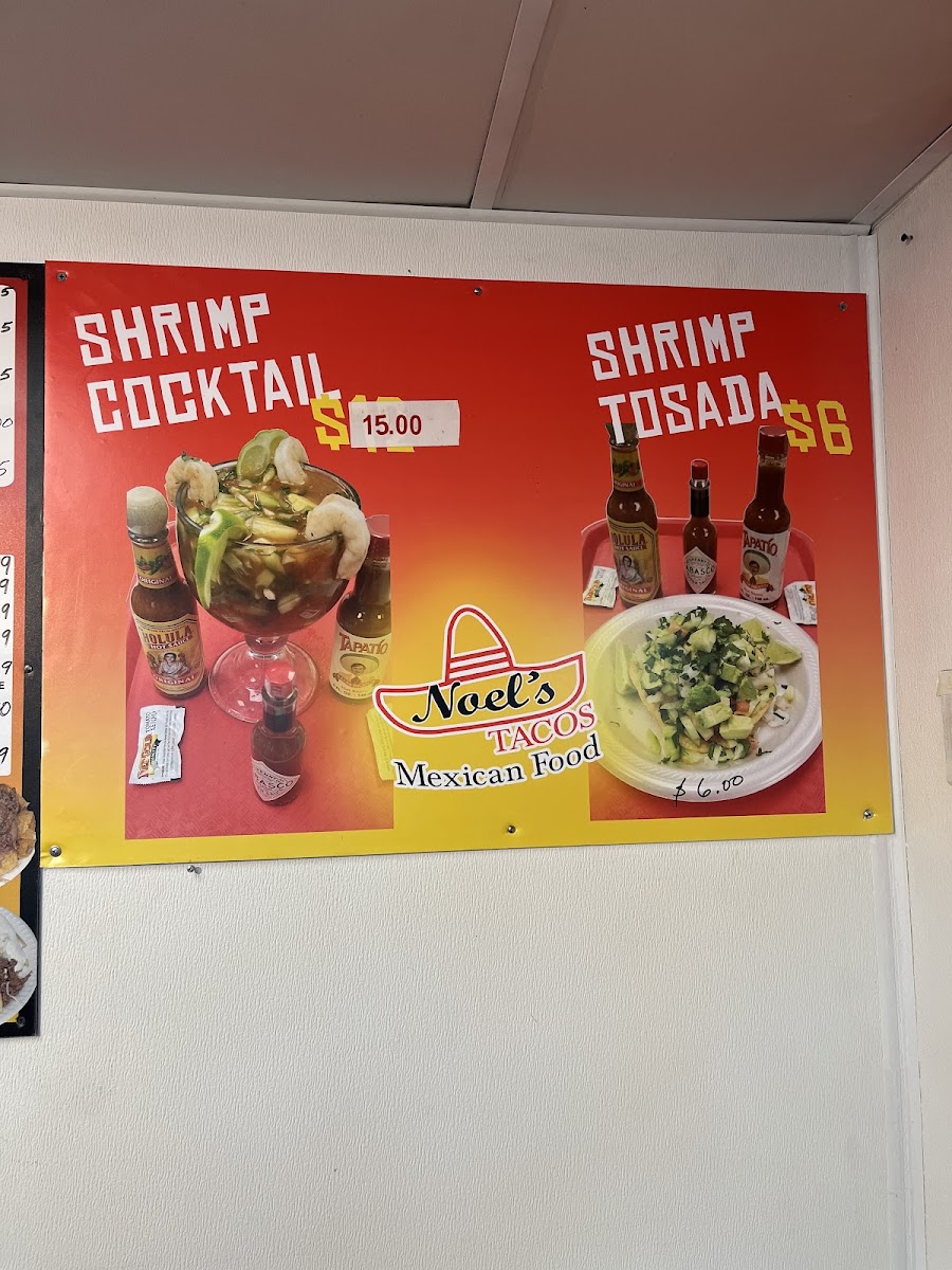 Noels tacos menu board