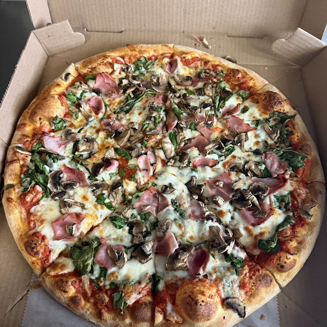 The Deluxe Pizza
