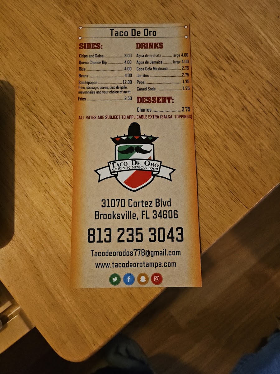 Taco De Oro menu board