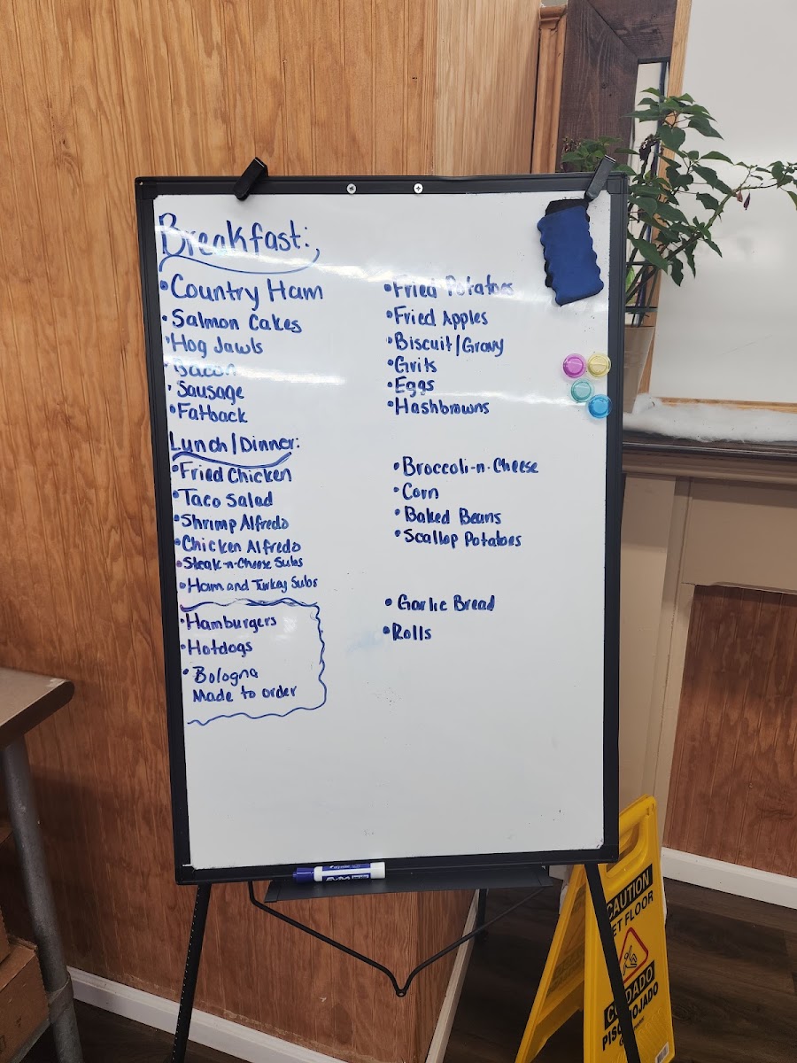 All in the Family Grill and Mini mart menu board
