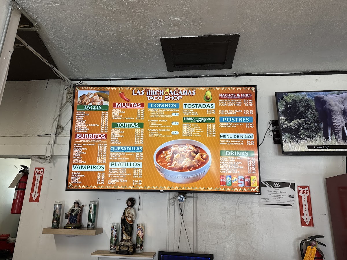 Las Michoacanas taco shop menu board