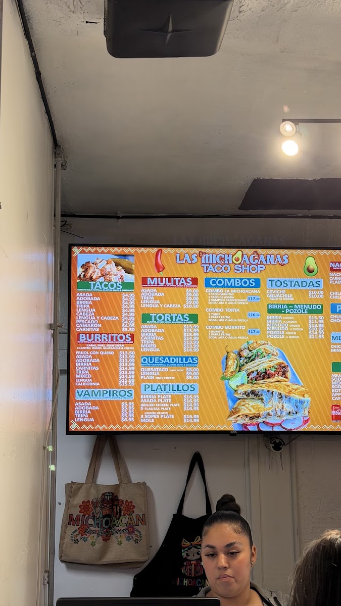 Las Michoacanas taco shop menu board