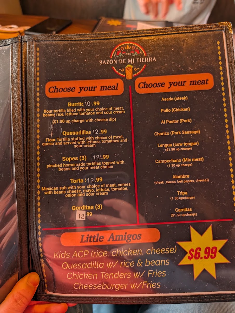 Sazón de mi Tierra menu board