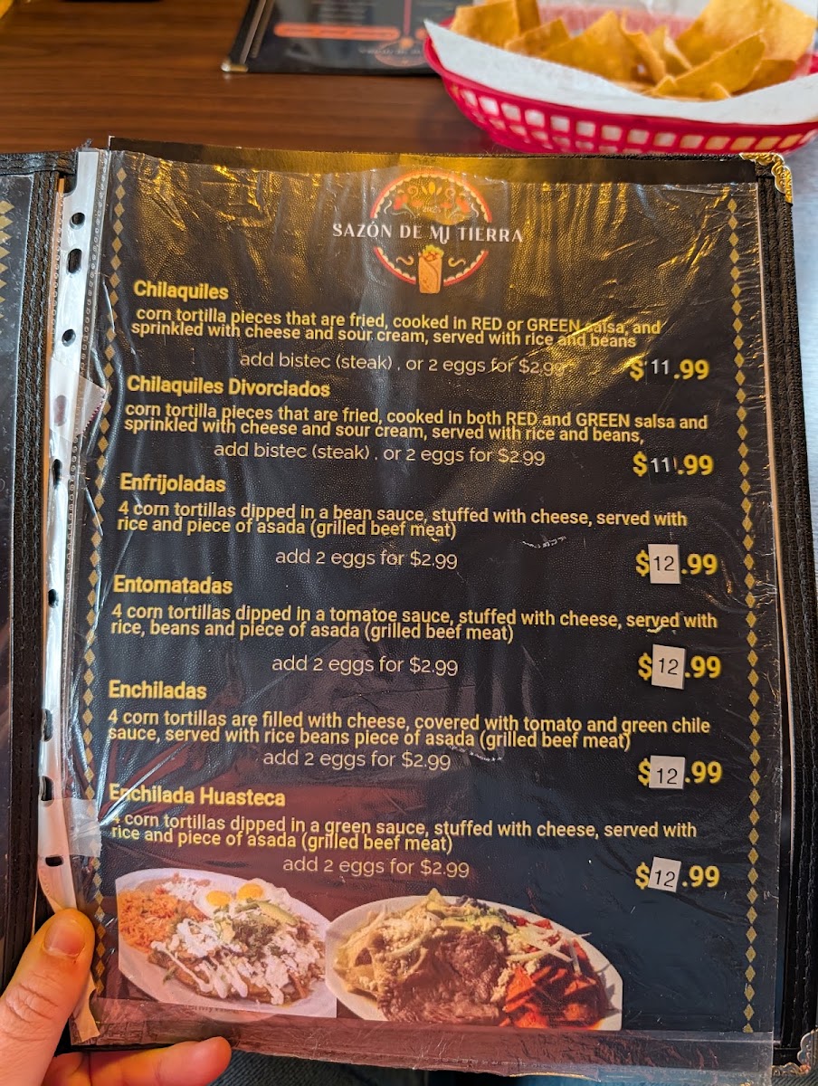 Sazón de mi Tierra menu board