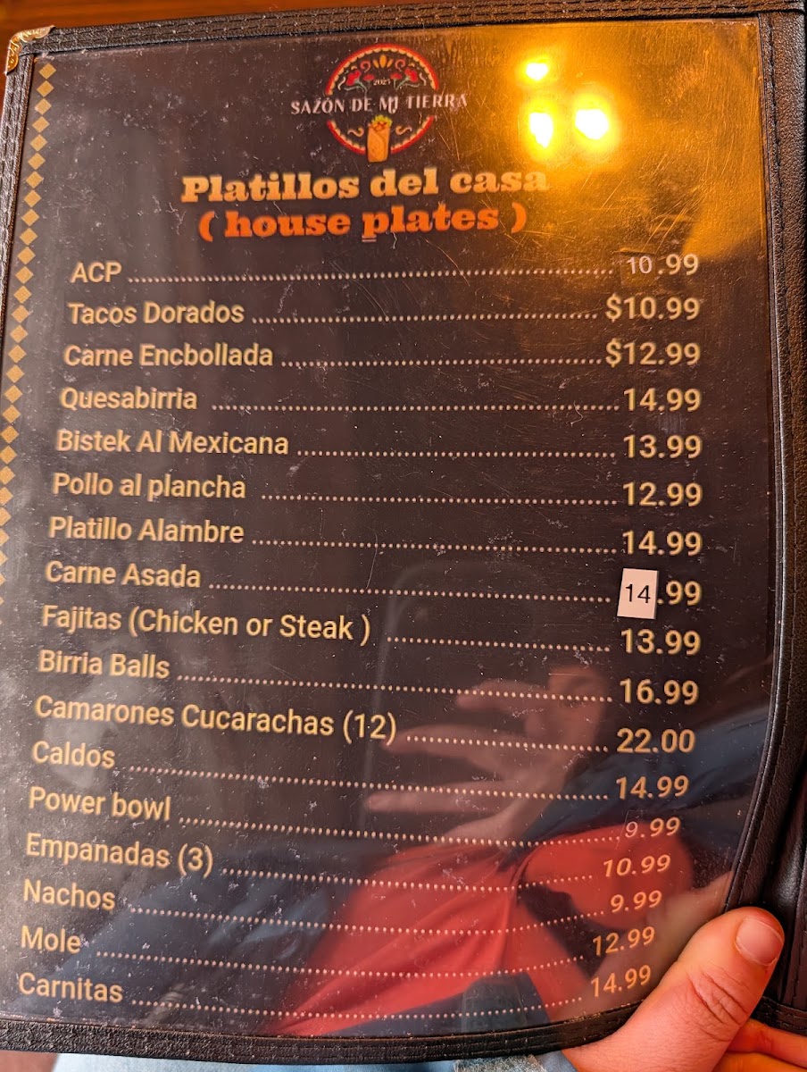 Sazón de mi Tierra menu board