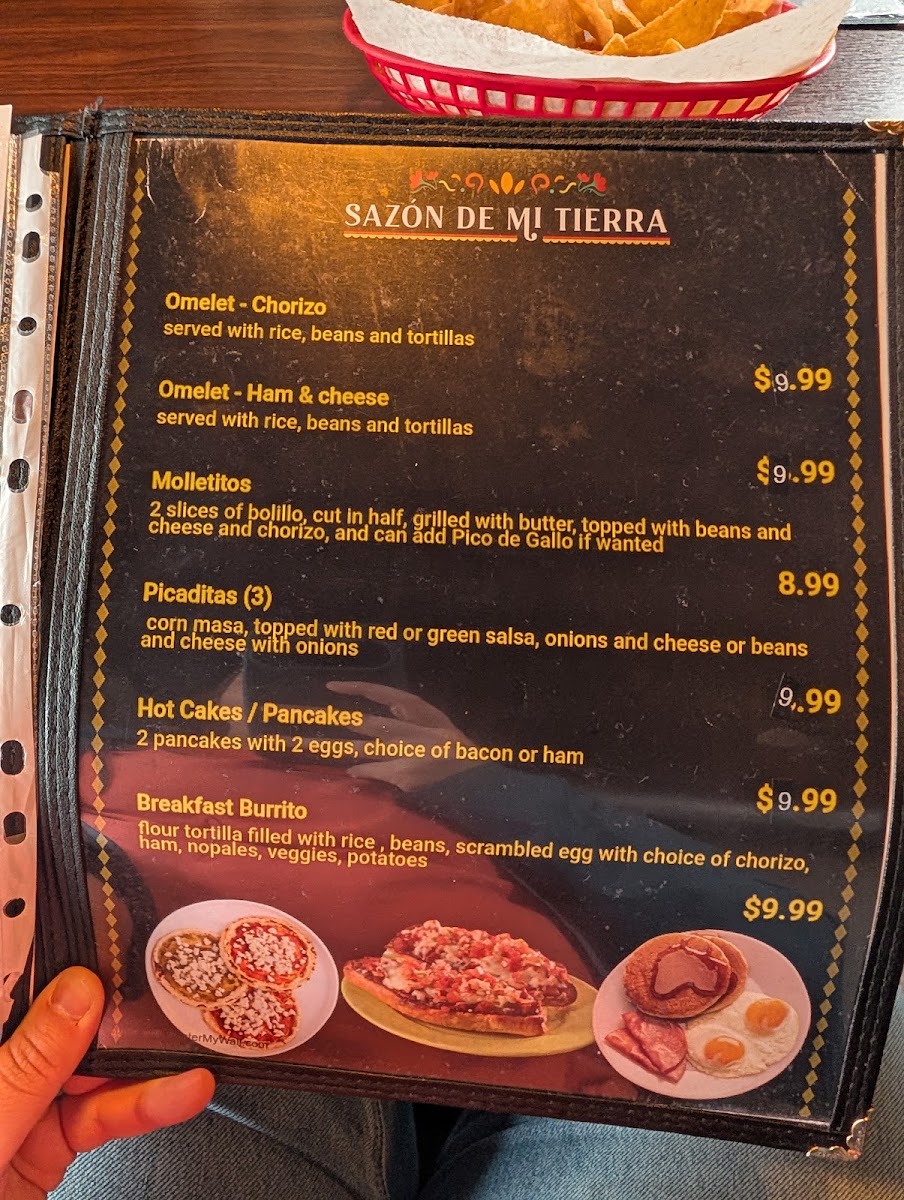Sazón de mi Tierra menu board