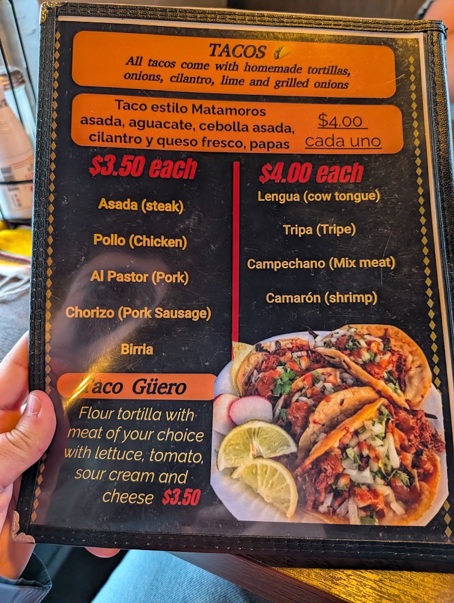 Sazón de mi Tierra menu board