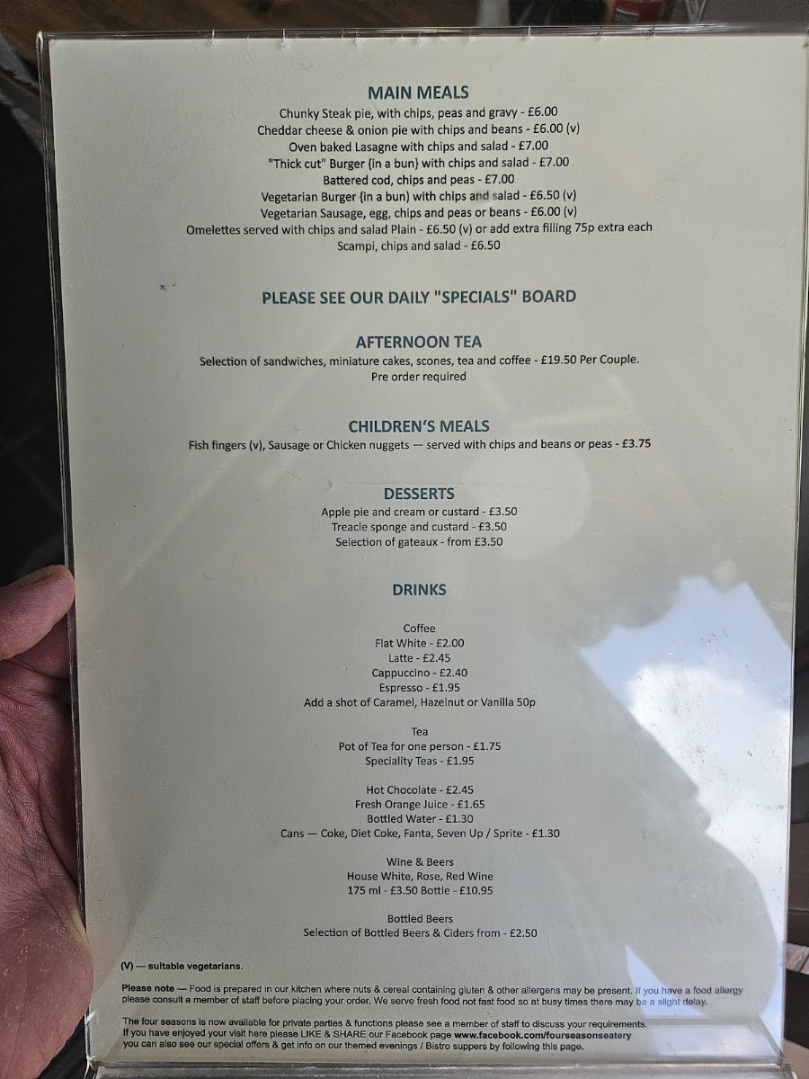The 4 Seasons Eatery menu board