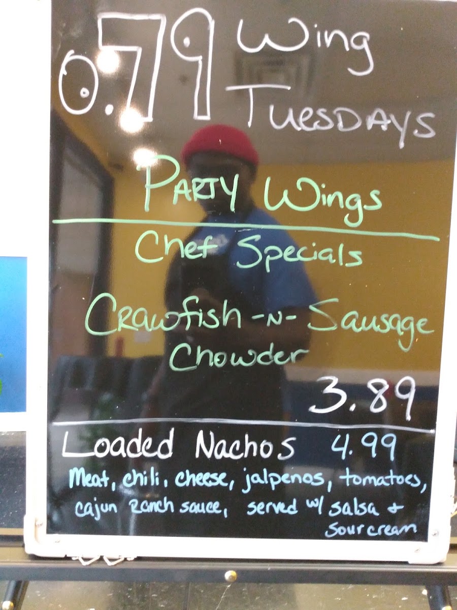 Big Myrt's Wings and Things menu board