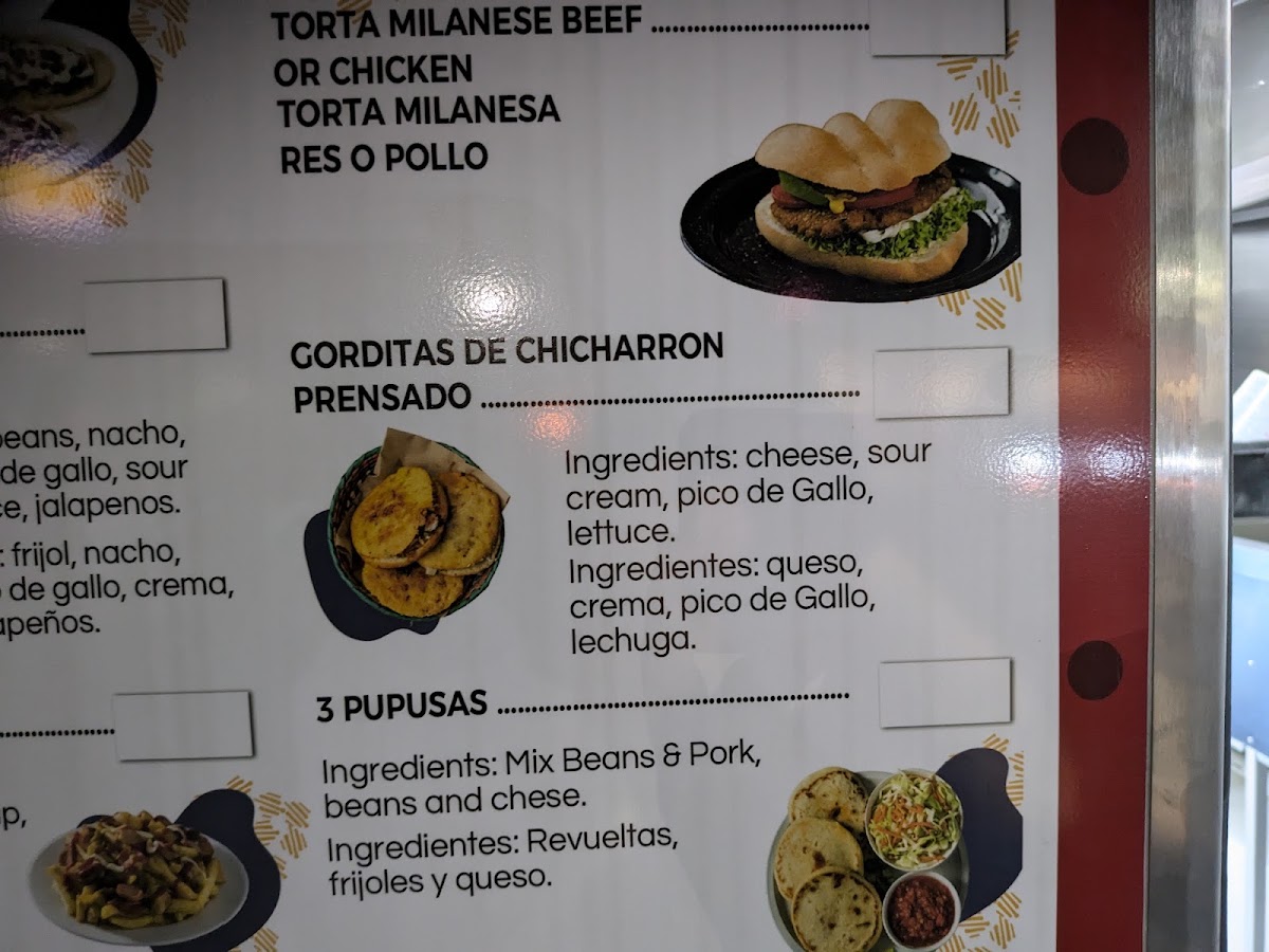 Taqueria Los Milagros menu board