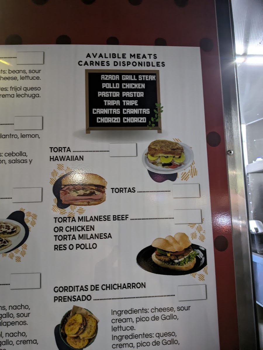 Taqueria Los Milagros menu board