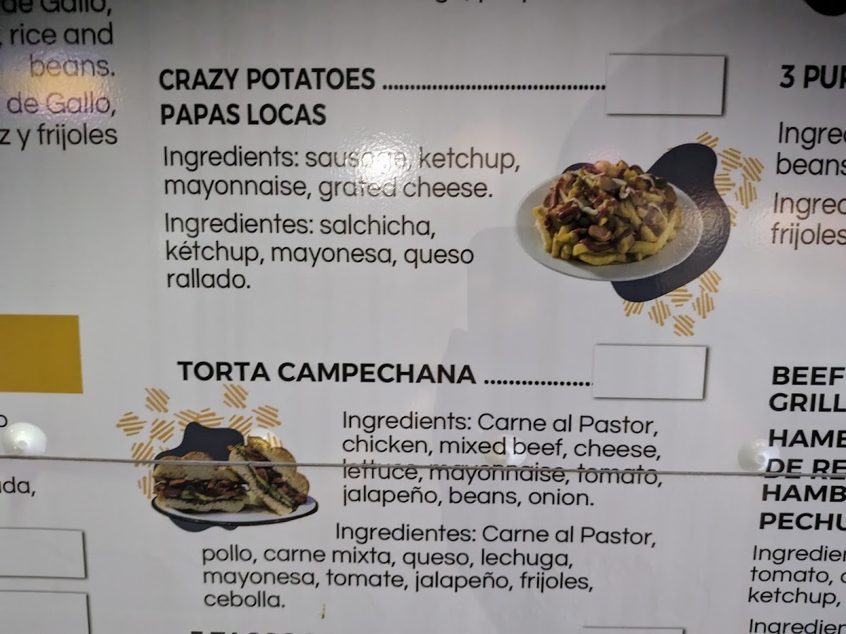 Taqueria Los Milagros menu board