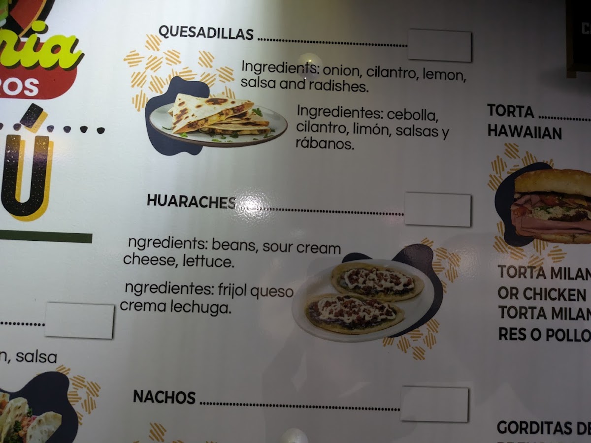 Taqueria Los Milagros menu board