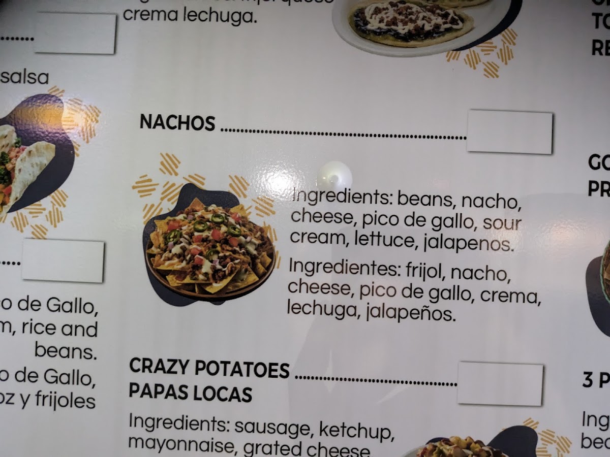 Taqueria Los Milagros menu board