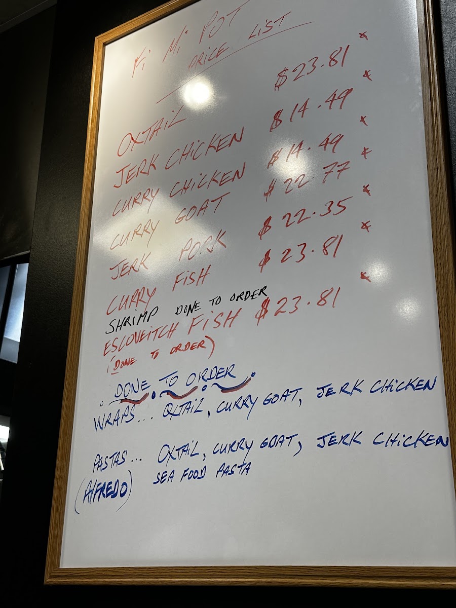 Fi Mi Pot Jamaican Restaurant menu board