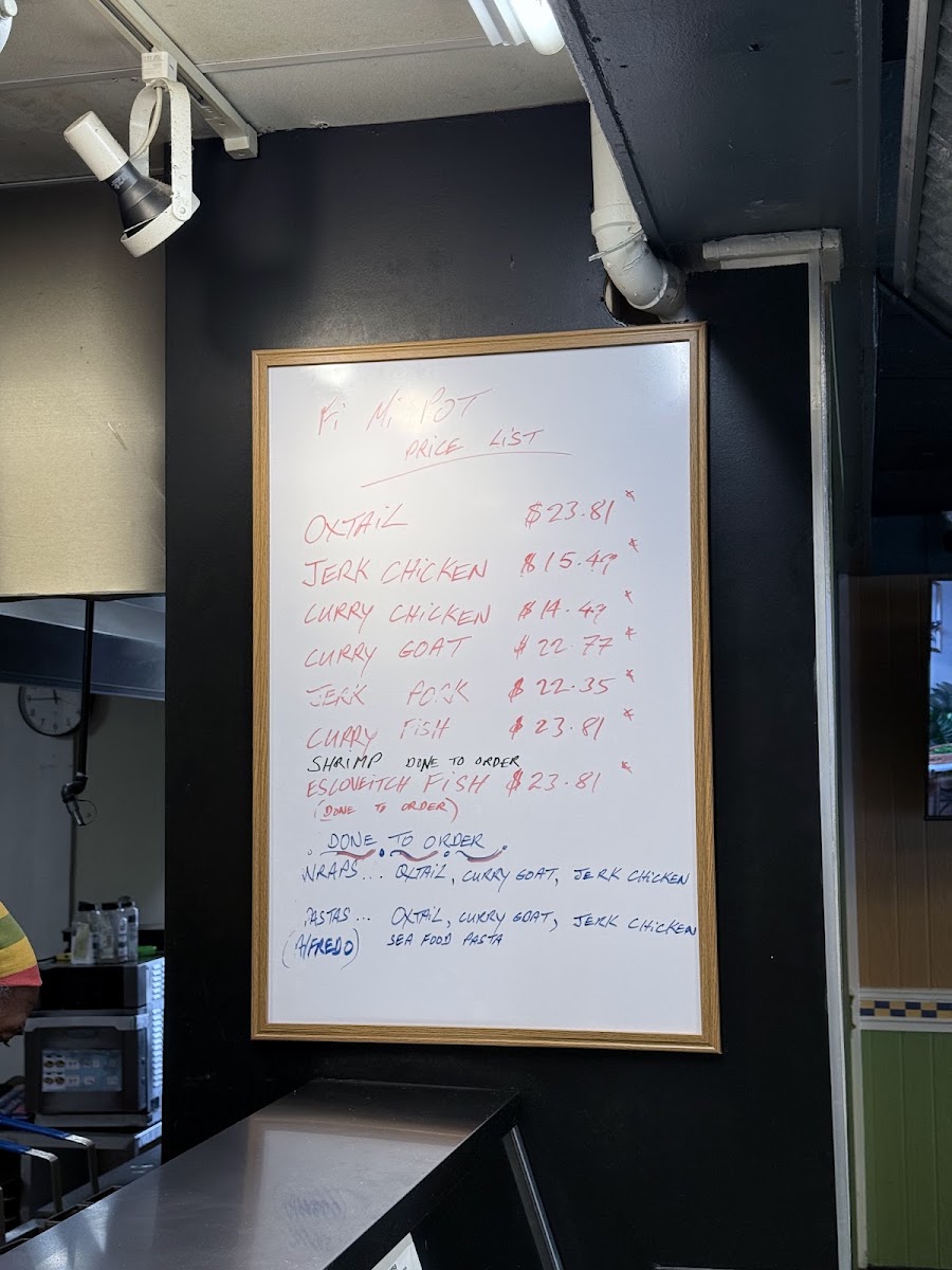 Fi Mi Pot Jamaican Restaurant menu board