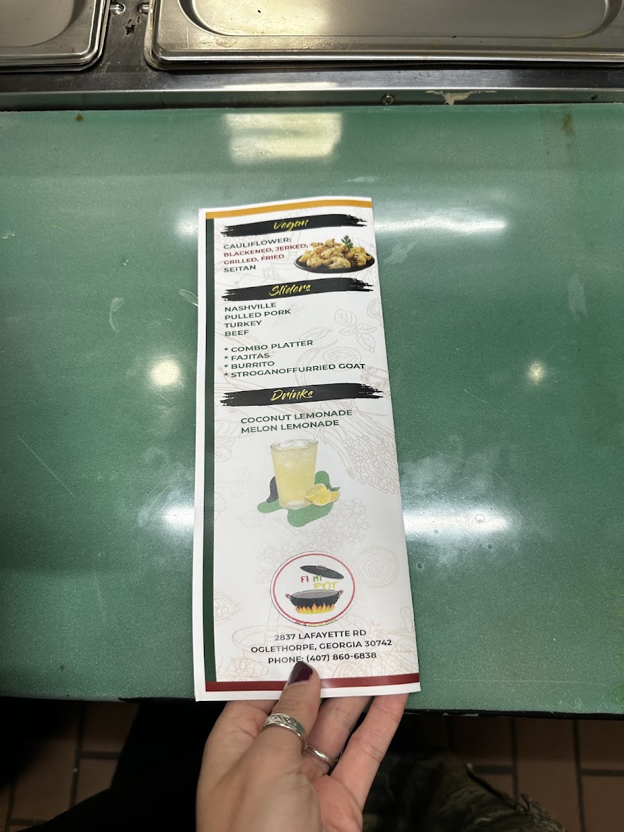 Fi Mi Pot Jamaican Restaurant menu board