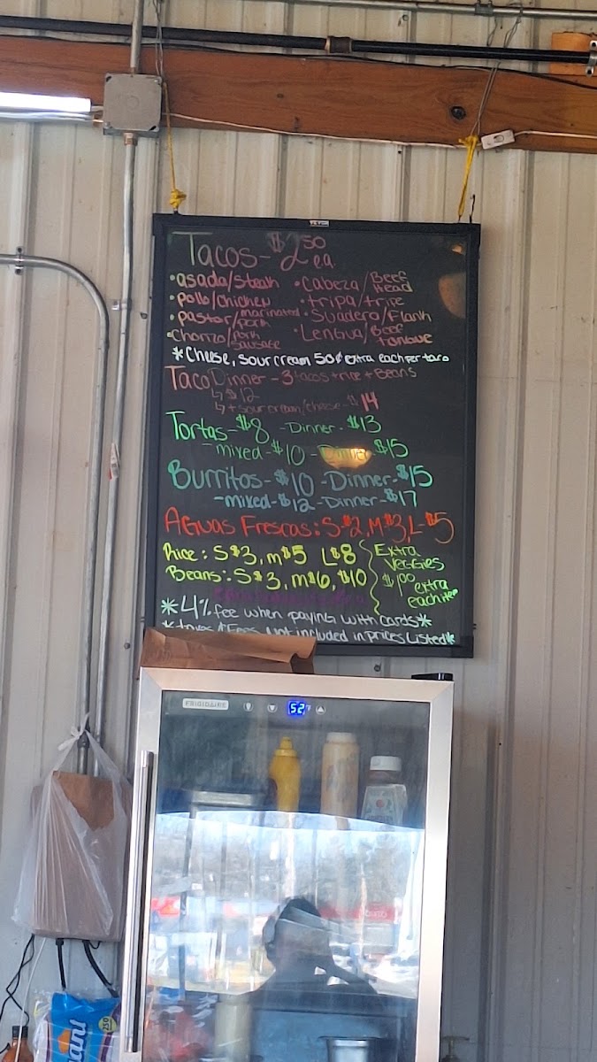 La Morenita Taqueria menu board
