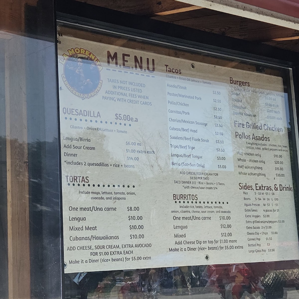 La Morenita Taqueria menu board