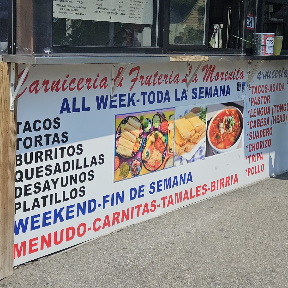 La Morenita Taqueria menu board