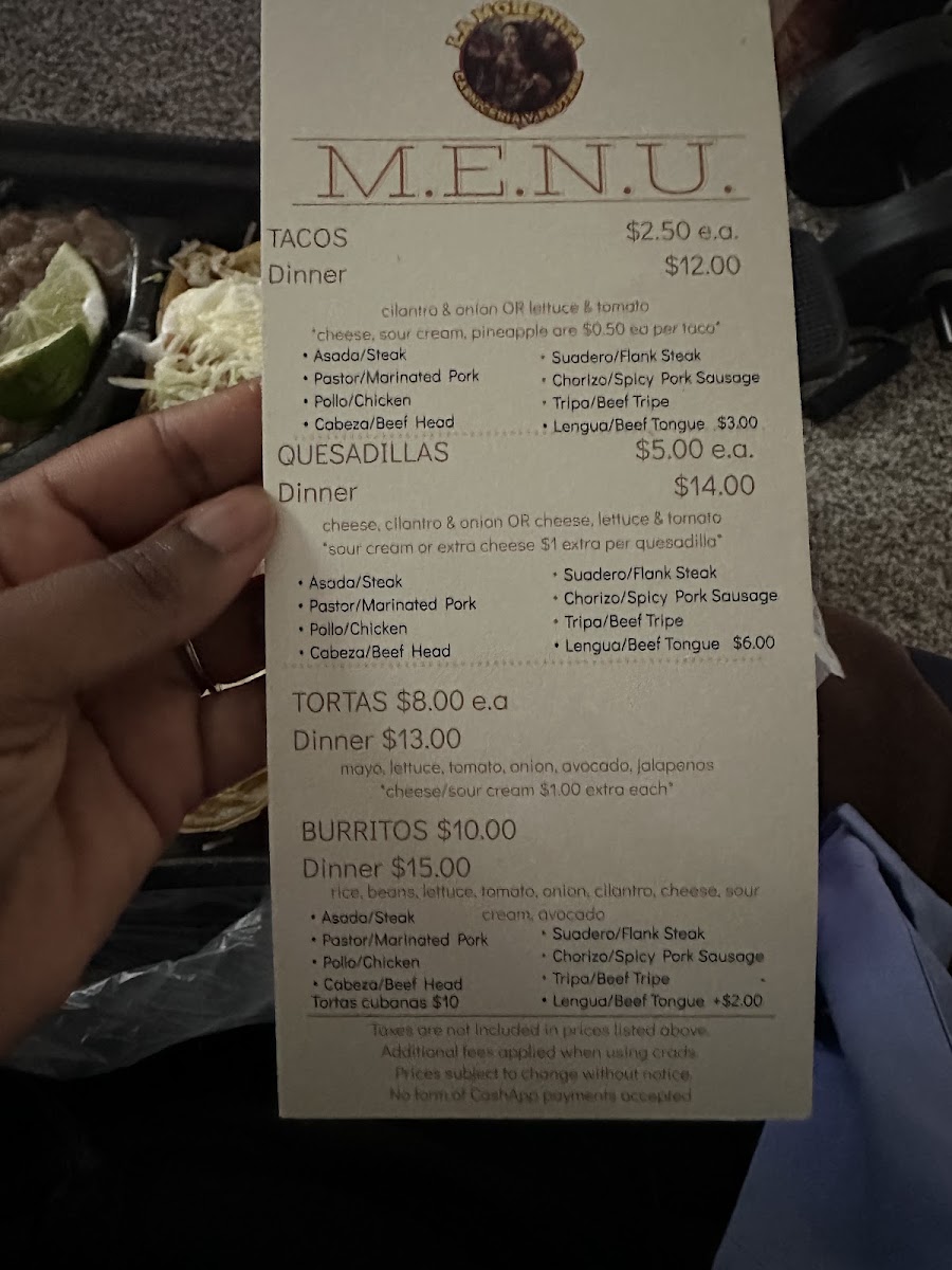 La Morenita Taqueria menu board