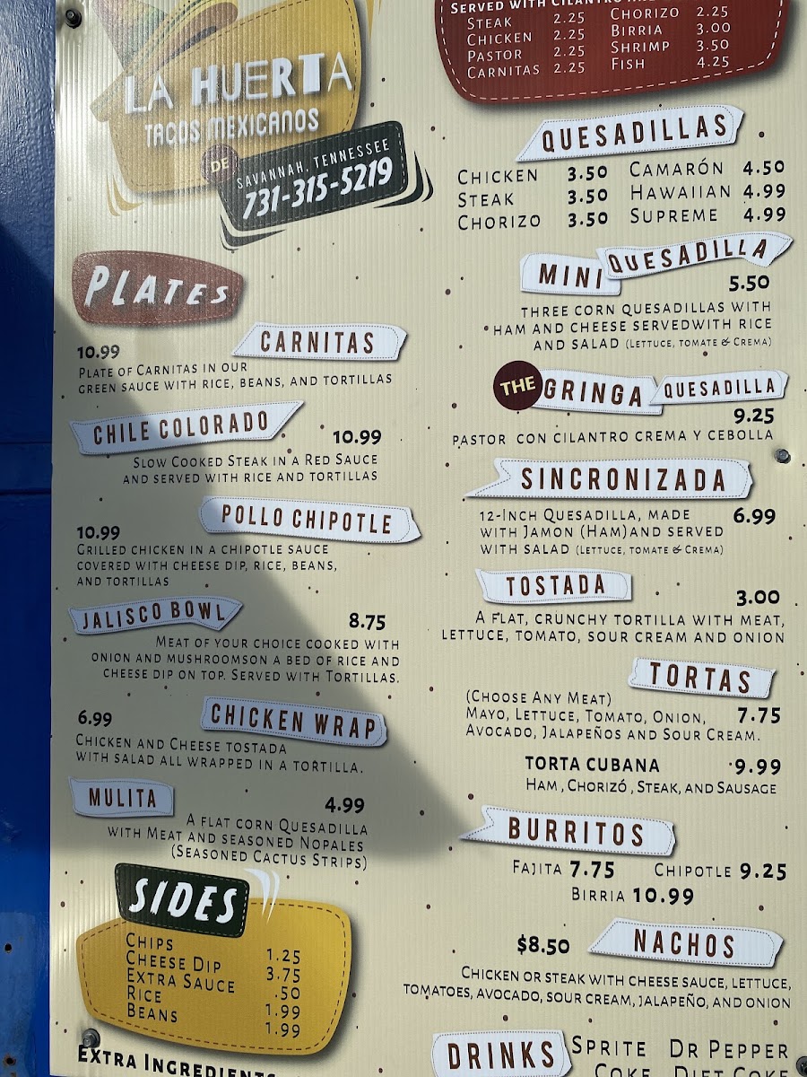 TACOS LA HUERTA menu board