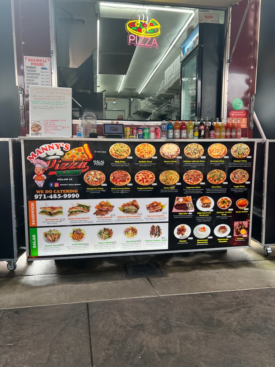 Manny's Pizza Planet Restaurante & Catering menu board