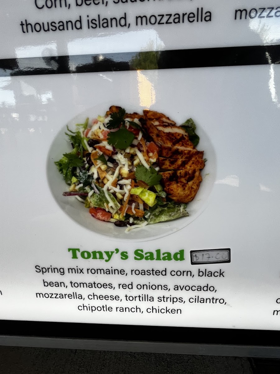 Manny's Pizza Planet Restaurante & Catering menu board