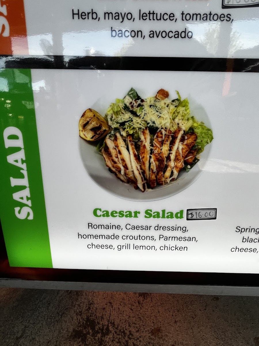 Manny's Pizza Planet Restaurante & Catering menu board