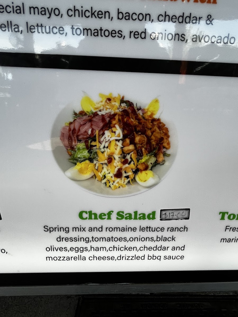 Manny's Pizza Planet Restaurante & Catering menu board