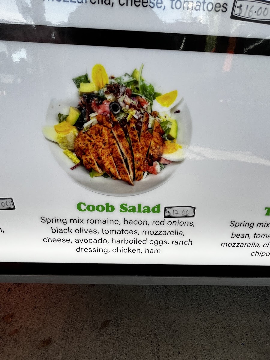 Manny's Pizza Planet Restaurante & Catering menu board